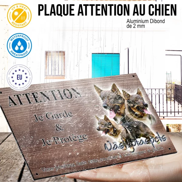 Panneau attention au chien Trois Västgötaspets avec un fond transparent