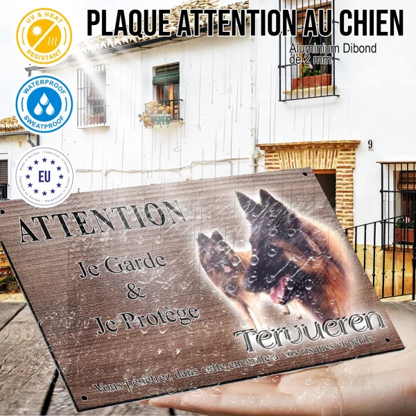 Panneau attention au chien Chien Tervuren en gros plan et entier dans le fond
