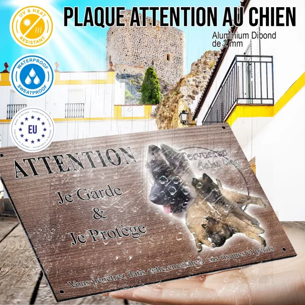Panneau attention au chien Chiots Tervuren adorables avec des pelages bruns et noirs