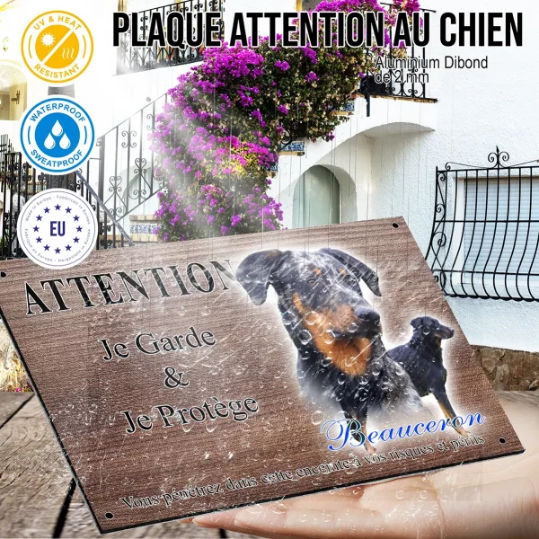 Panneau attention au chien Portrait d'un Beauceron avec un chien en profil