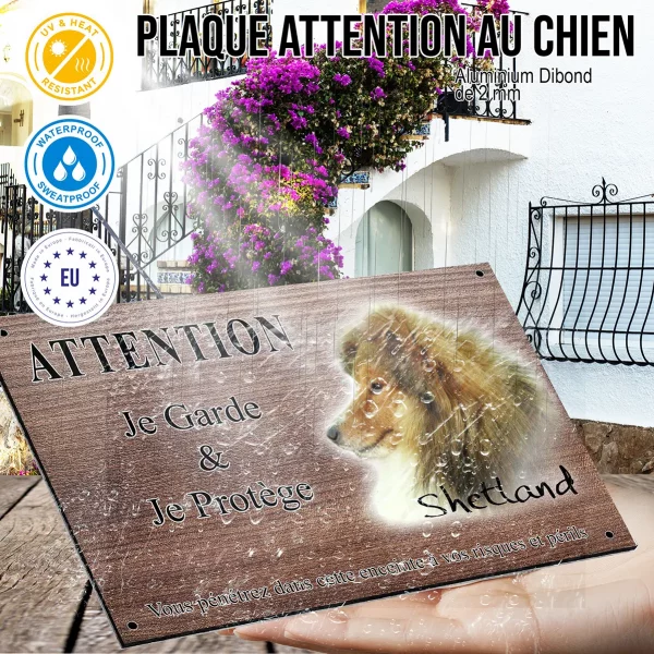 Panneau attention au chien Chien de race Shetland avec un pelage flamboyant