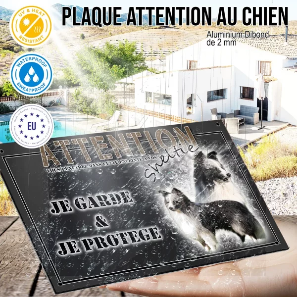 Panneau chien de garde Un Sheltie avec un pelage noir et blanc