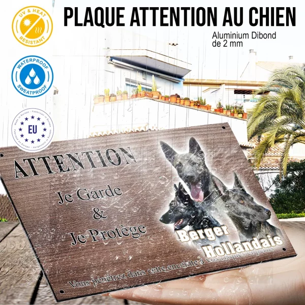 Panneau attention au chien Trois chiens Berger Hollandais en gros plan