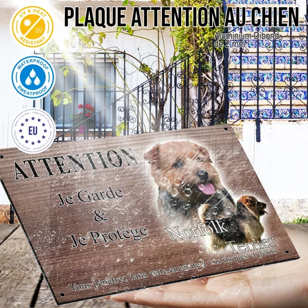 Panneau attention au chien Norfolk Terrier avec un gros plan et un chien entier en profil