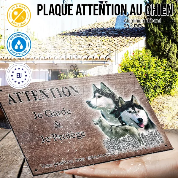 panneau attention au chien Trois Husky Sibériens sur fond coloré