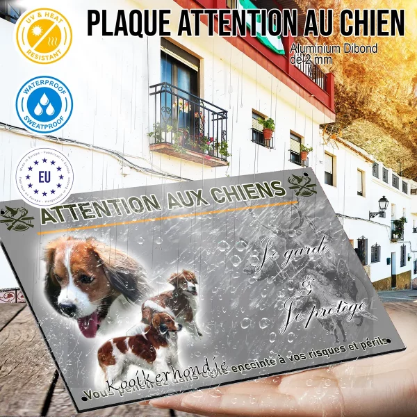 panneau Trois Kooikerhondjes en mouvement avec un texte en bas