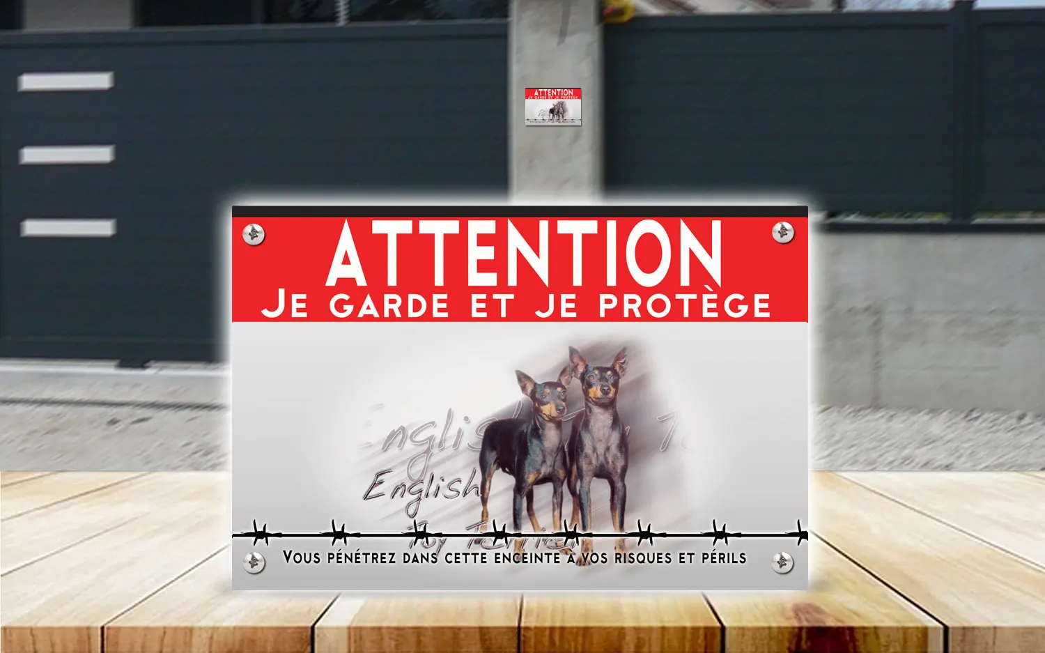 Plaque attention au chien english toy terrier en dibond 2 mm, posée sur un portail